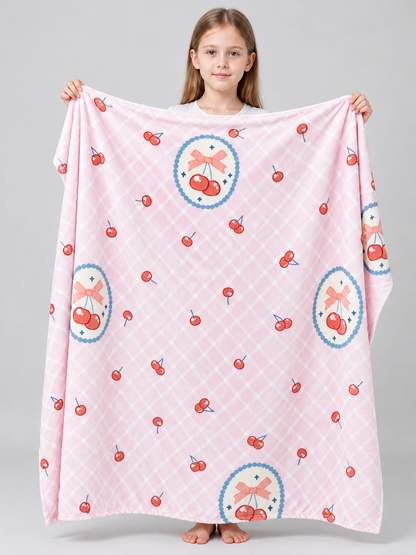 Pink reversible blanket with cherry and bow print, polyester