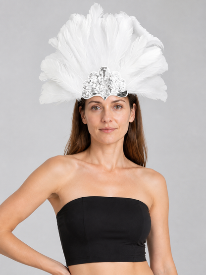 Model wearing the white feather headband with a black strapless top, showing the large feather fan and silver sequins