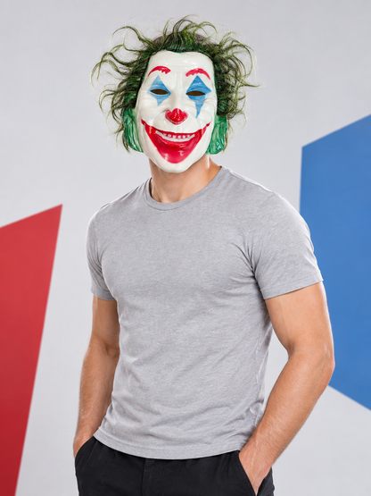 Clown mask with white face, red nose, green hair