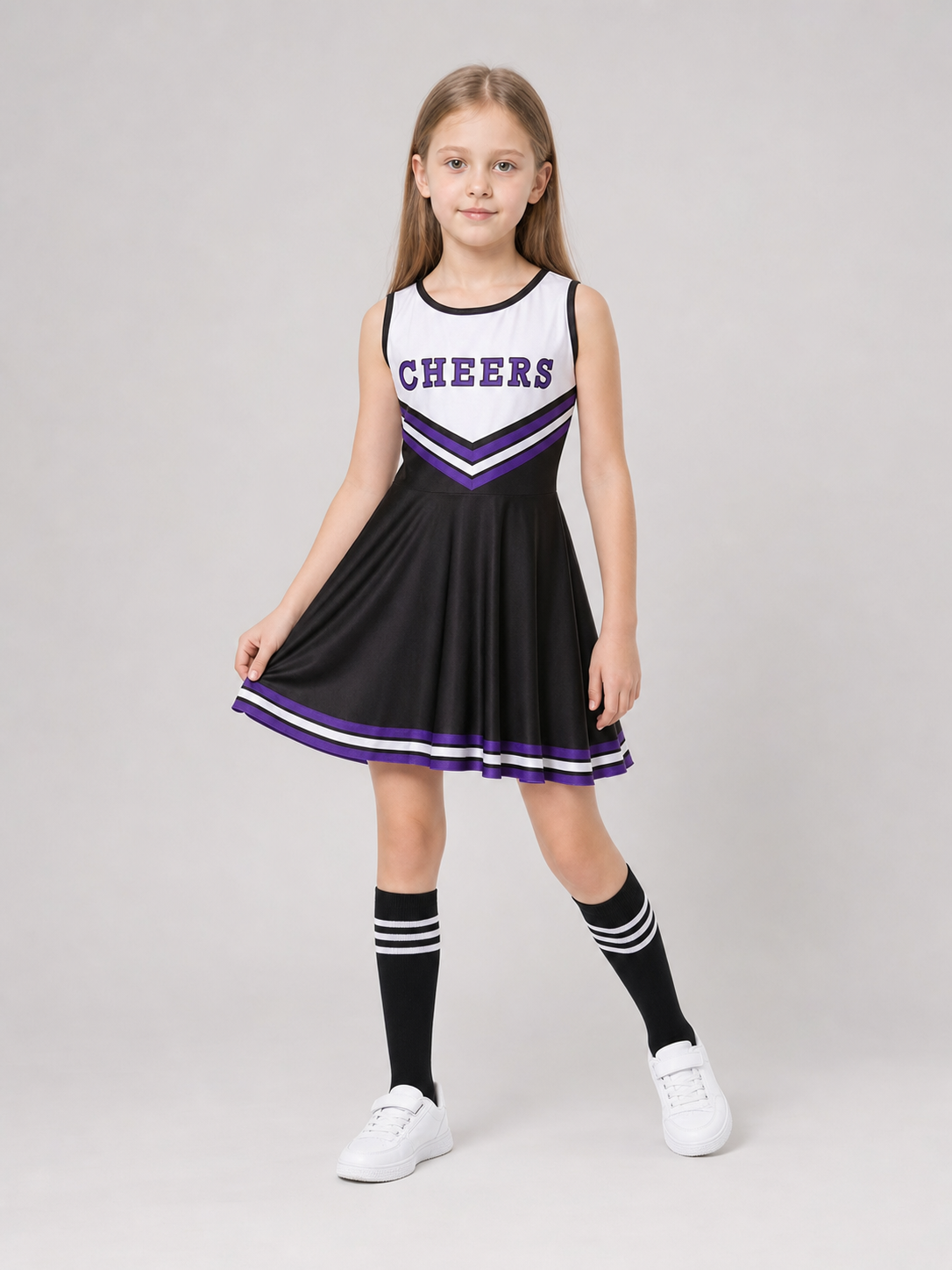 Cheerleading costume with pom-poms, dress, and leg warmers