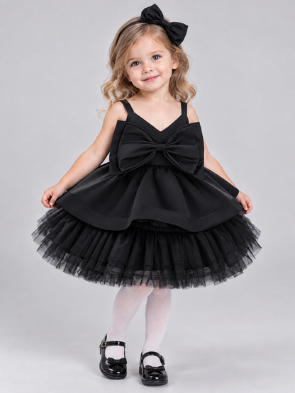 Black dress with bow and layered tulle skirt