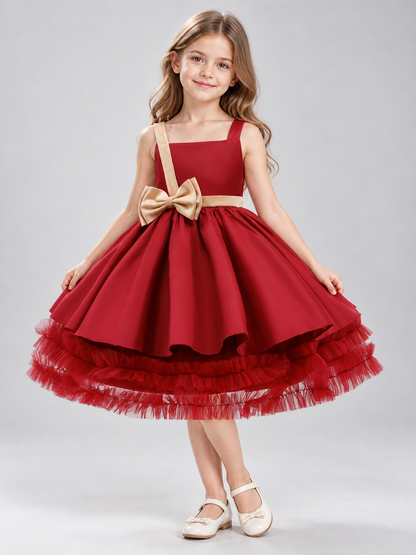 Burgundy sleeveless dress with gold bow and full skirt