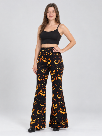 Black Flared Carnival Pants with Orange Smiling Pumpkin Print