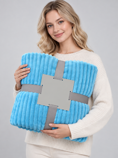 Blue throw blanket made of soft fluffy polyester flannel