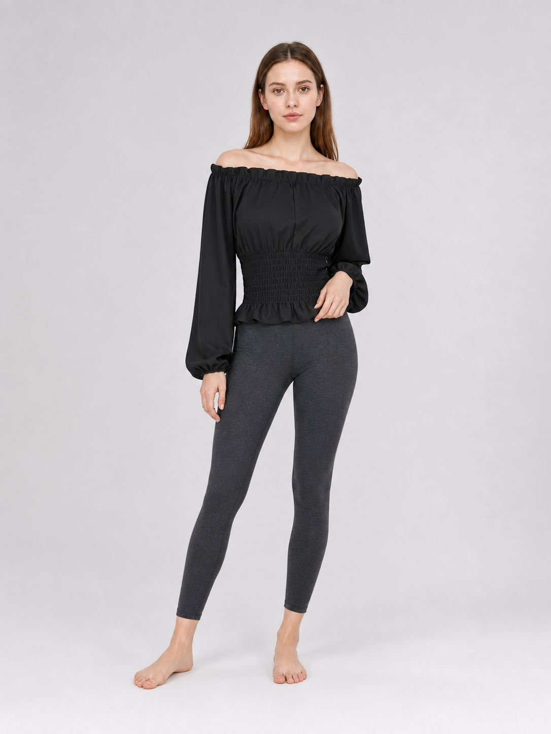 Black off-the-shoulder blouse with ruffles
