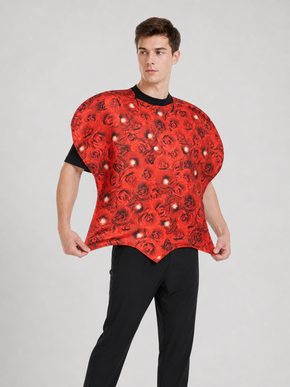 Bright heart-shaped costume with a floral print. A voluminous silhouette with a pointed lower edge and wide short sleeves that extend from the sides of the garment. The surface is decorated with an allover floral pattern reminiscent of rose
