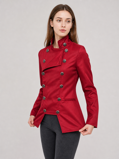 The jacket is presented in a vintage red color and designed in a military style with elements of Gothic aesthetics. The model features a distinctive front construction with a diagonal wrap, giving the garment a bold character. A double row 