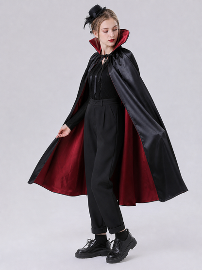 The long black cape is designed to create a vampire look for cosplay, Halloween, and stage performances. The cape is black and features a loose silhouette with long, draping panels and an opening lower edge. The upper section has a hooded o