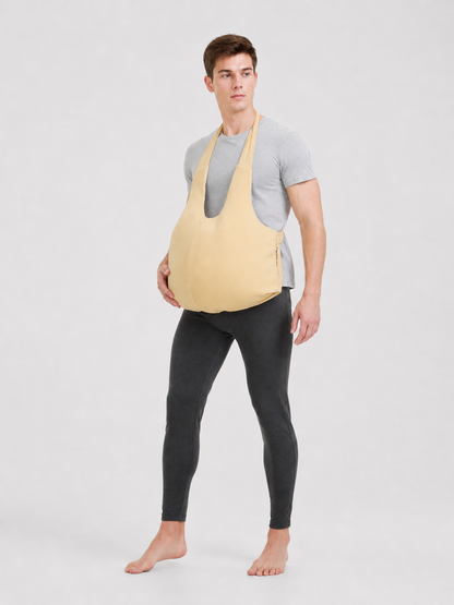 The fake belly is designed as a costume accessory with a large, rounded shape.