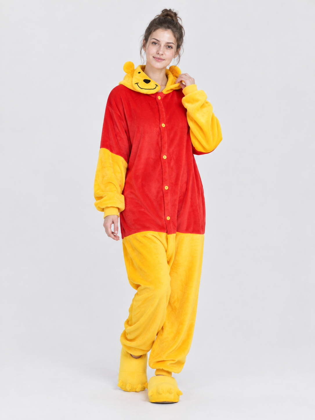 Red and yellow pajama jumpsuit with bear ears