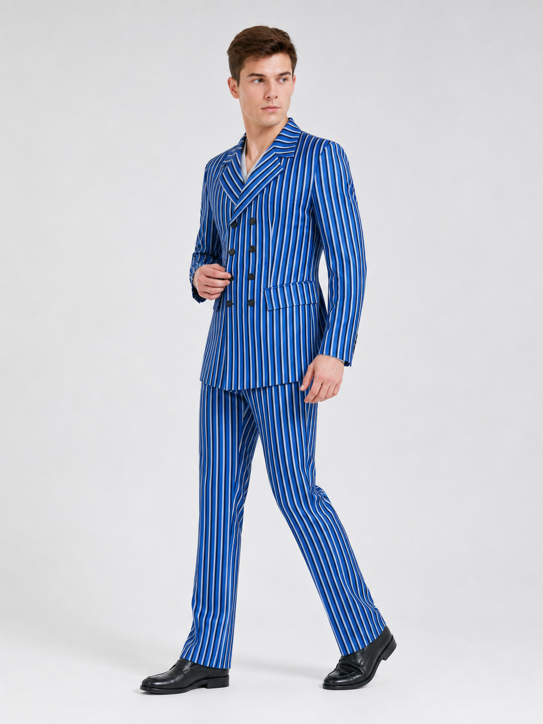 The Doctor Who cosplay double-breasted suit is designed in a white-and-blue color scheme with vertical stripes. The set includes a jacket and pants made in the same design. The jacket features a double-breasted closure, peaked lapels, and f