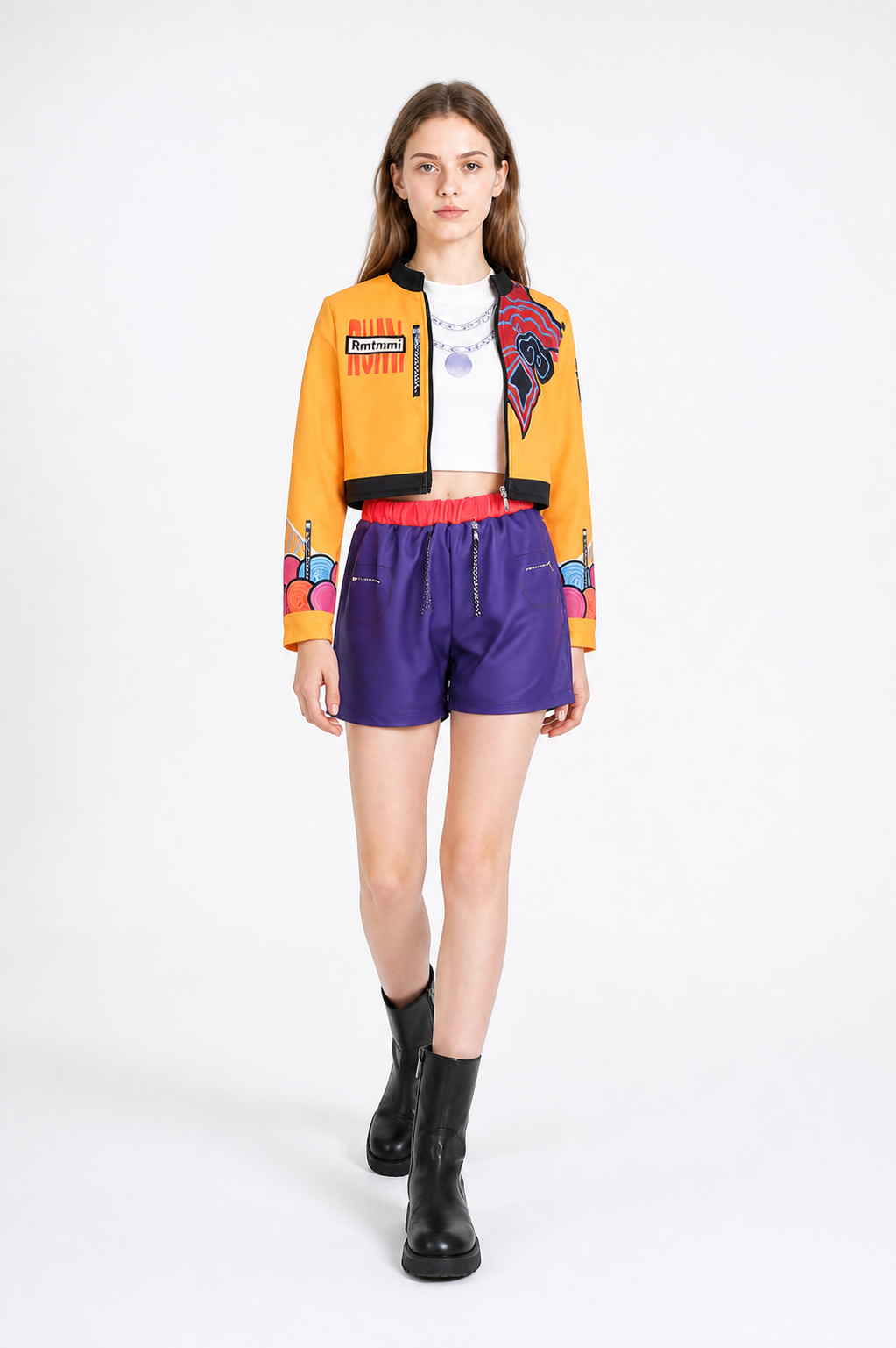 Children's set with an orange jacket and purple shorts product detail