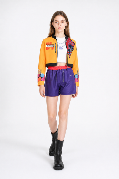Children's set with an orange jacket and purple shorts product detail