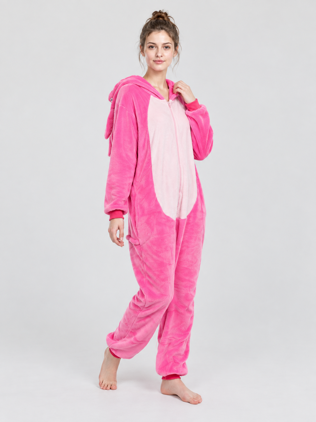 Pink pajama jumpsuit with hood, pocket, and zipper
