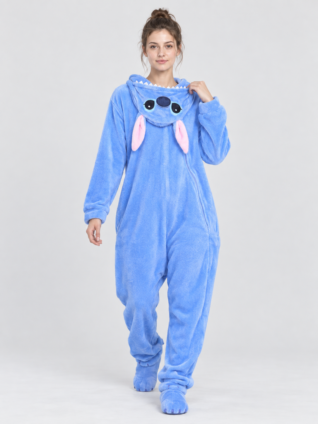 Blue pajama jumpsuit with a hood, ears, and tail