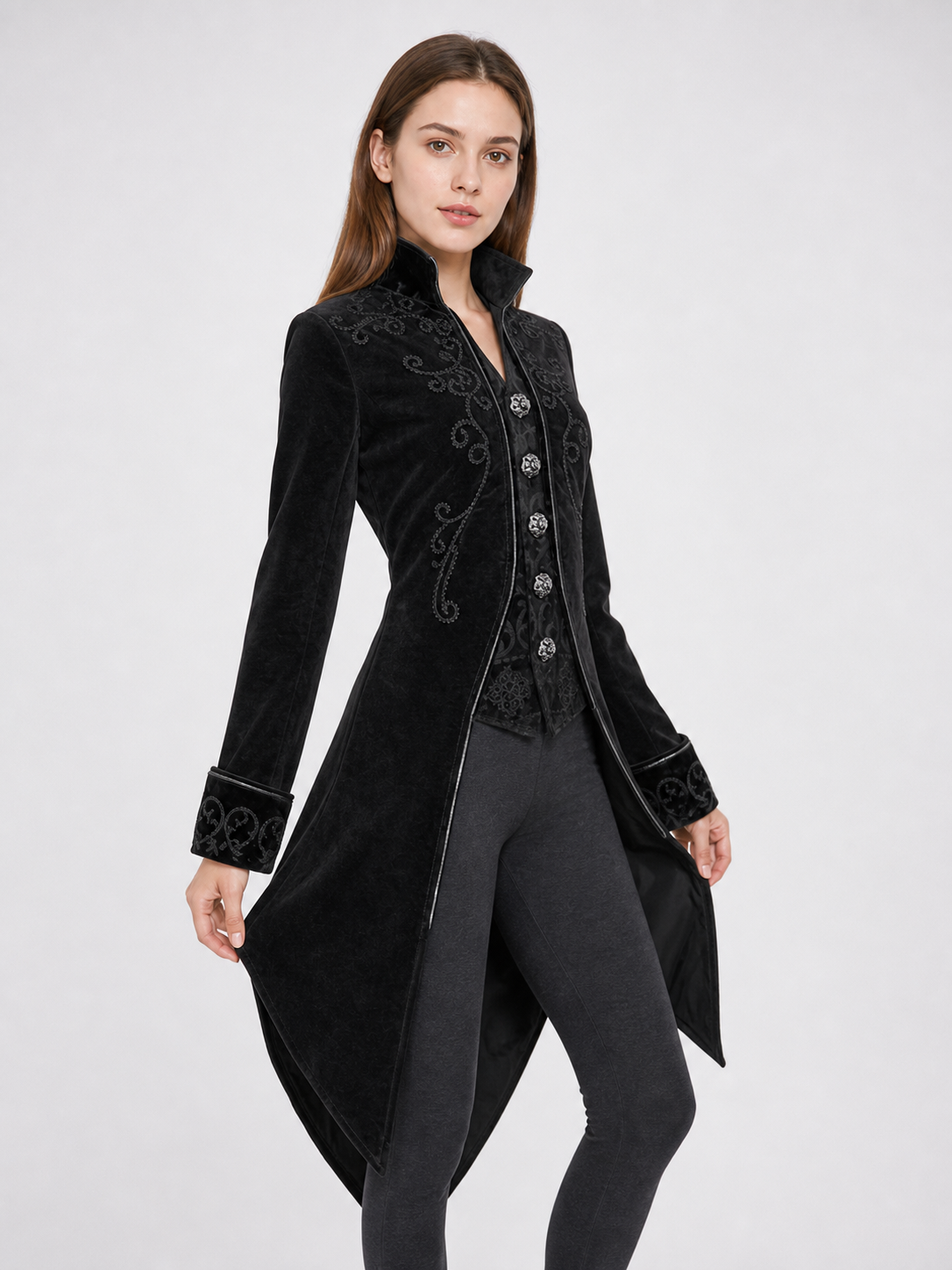 Black embroidered coat with a stand-up collar and pointed tails