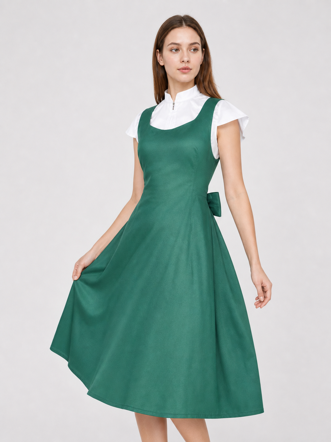 The green Kushina Uzumaki cosplay pinafore dress is designed in the recognizable style of the character from the anime Naruto: Shippuden. The design is a green pinafore dress with a square neckline, wide straps, and open pockets on the side