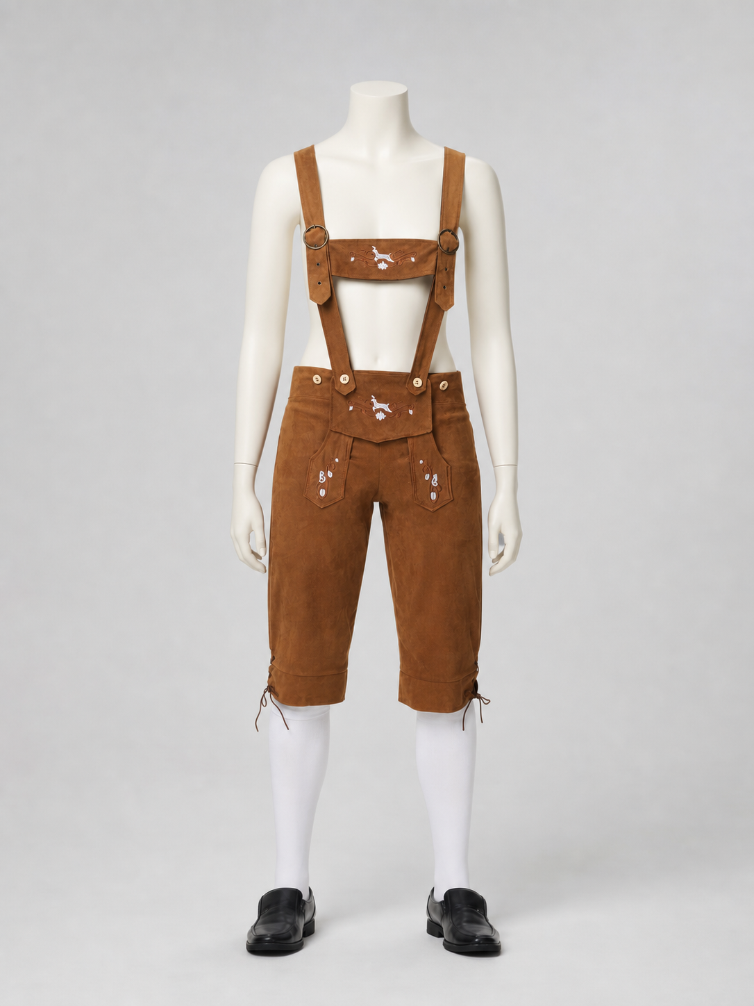 Brown folk role-play clothing designed as short shorts with a bib panel connected to shoulder suspenders and extending to the waistline. The outfit features an ethnic style and several front pockets, including pockets on the bib and shorts.