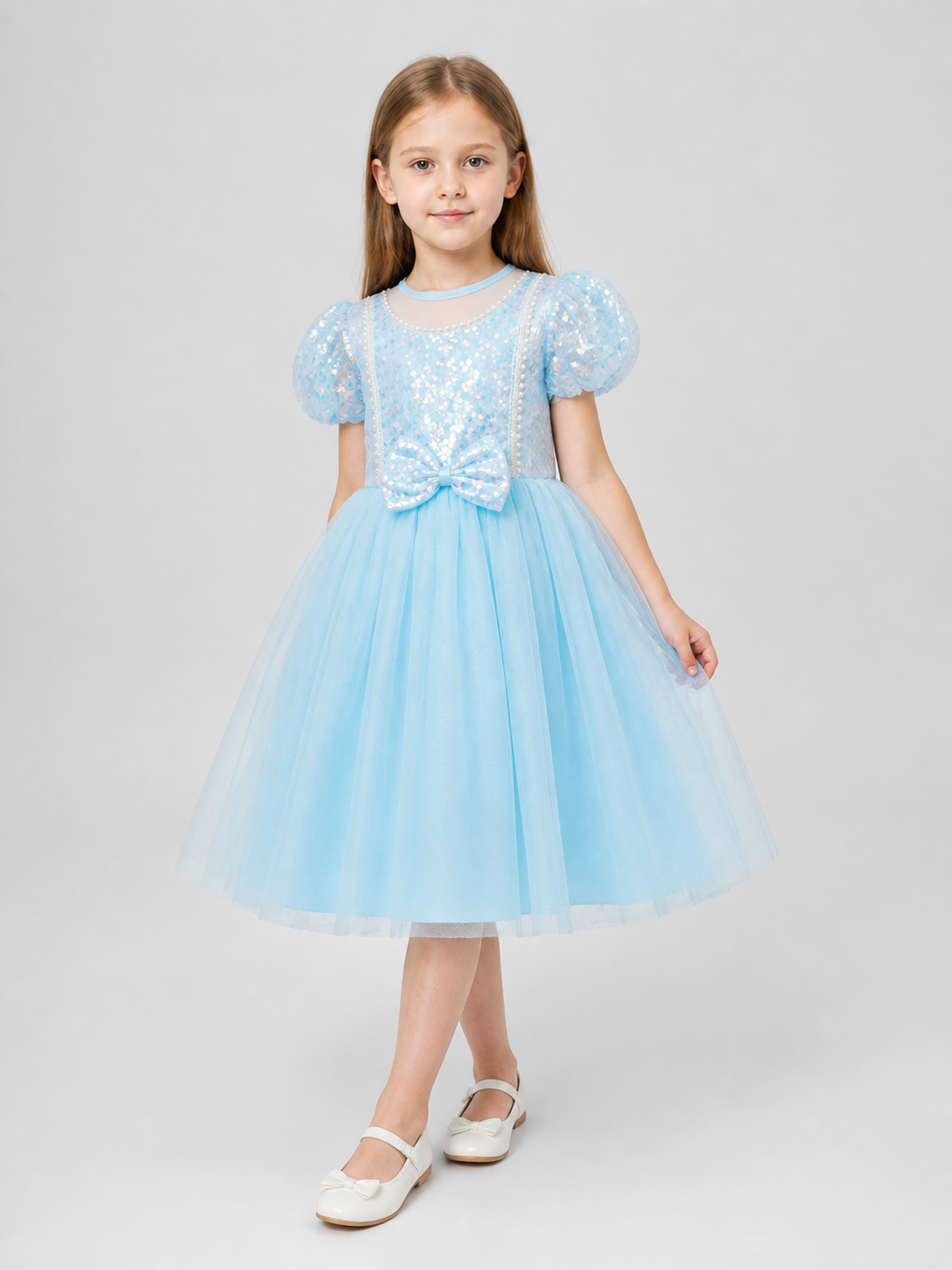 Party Dress with Sequins, a Full Skirt, and a Bow