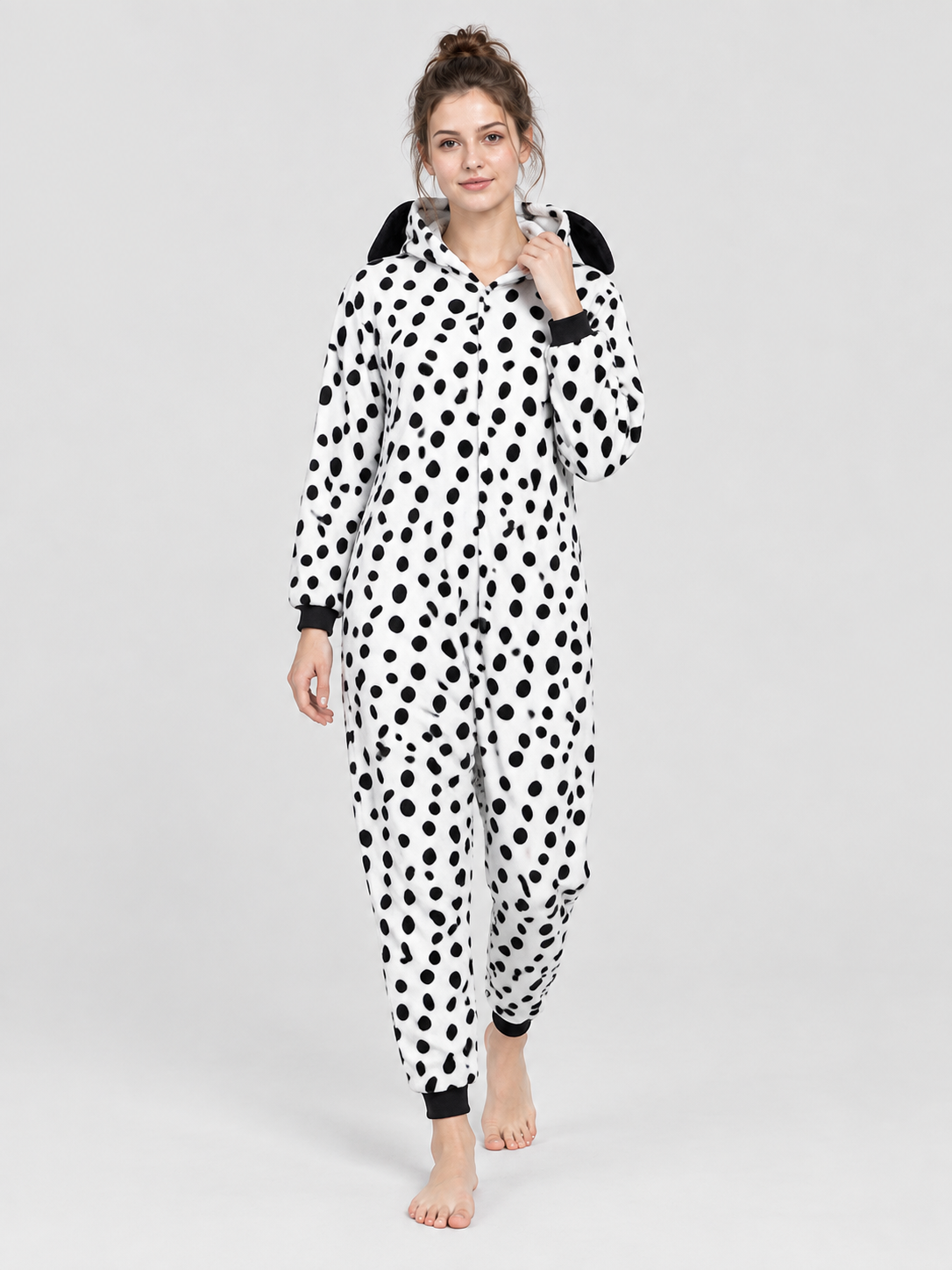 White pajama jumpsuit with black spots and ears