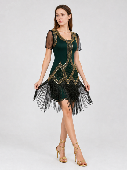 This fringed dress is designed in a vintage cocktail style, combining dark green