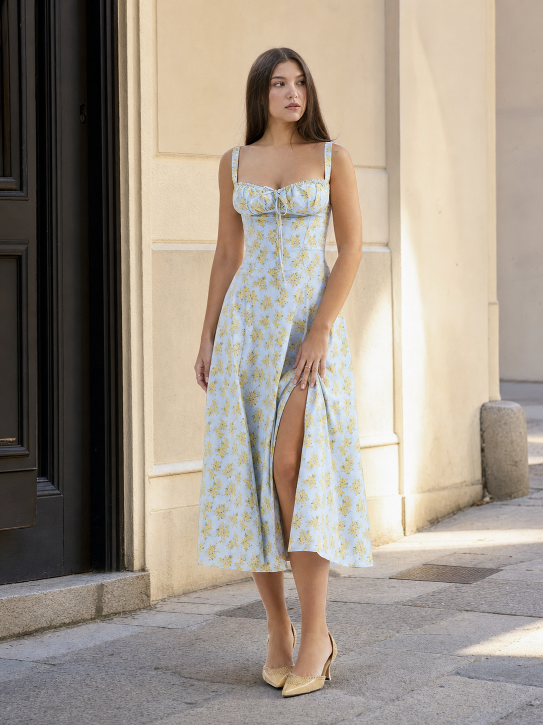 Women's midi dress with thin straps and a slit