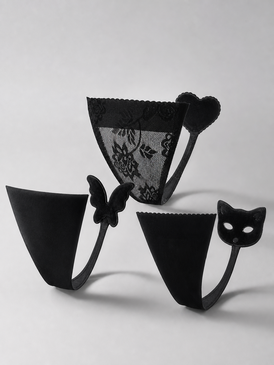 Black thongs, 3 designs, size S