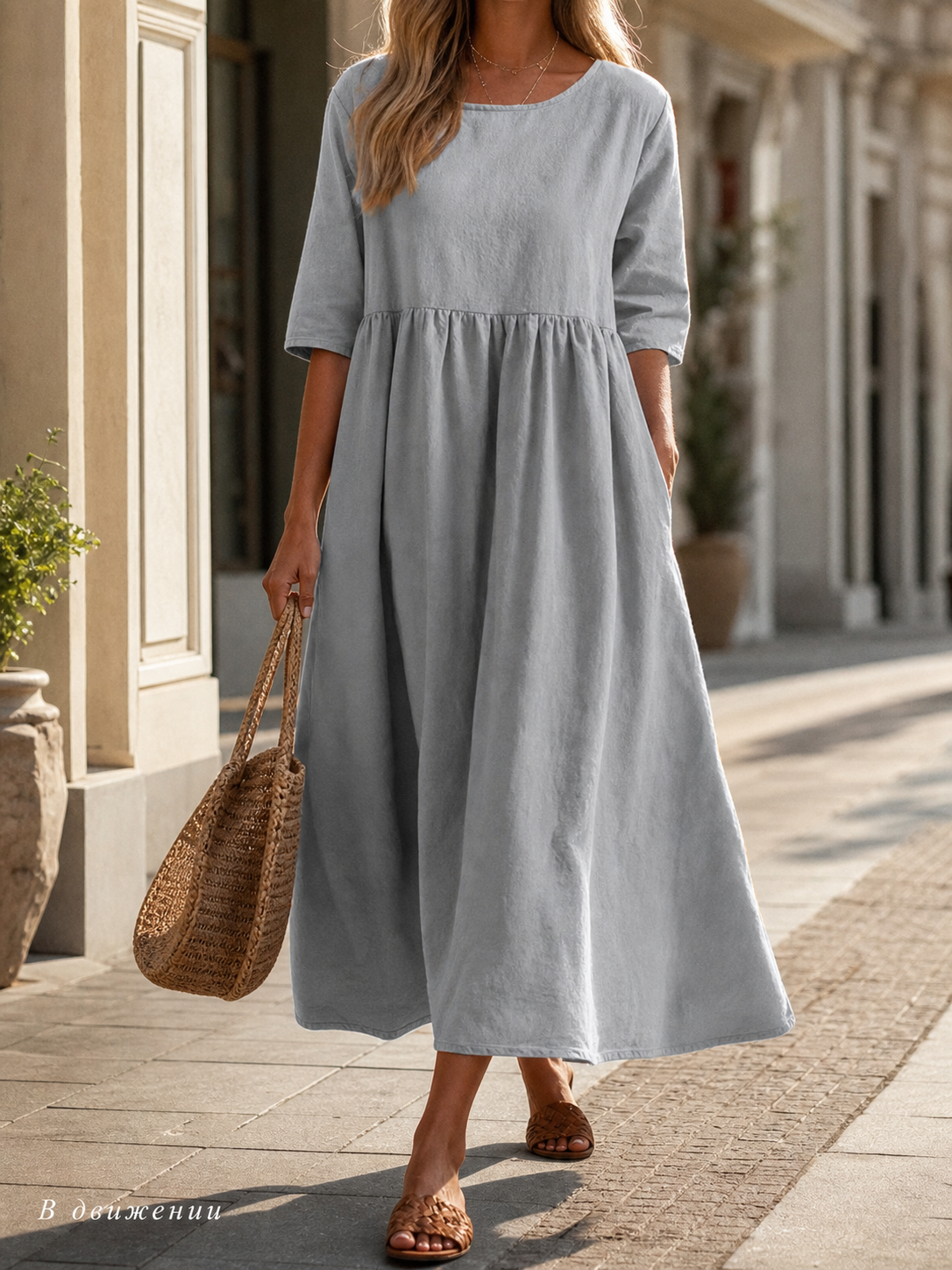 Long Gray Dress with 3/4 Sleeves and an A-Line Silhouette