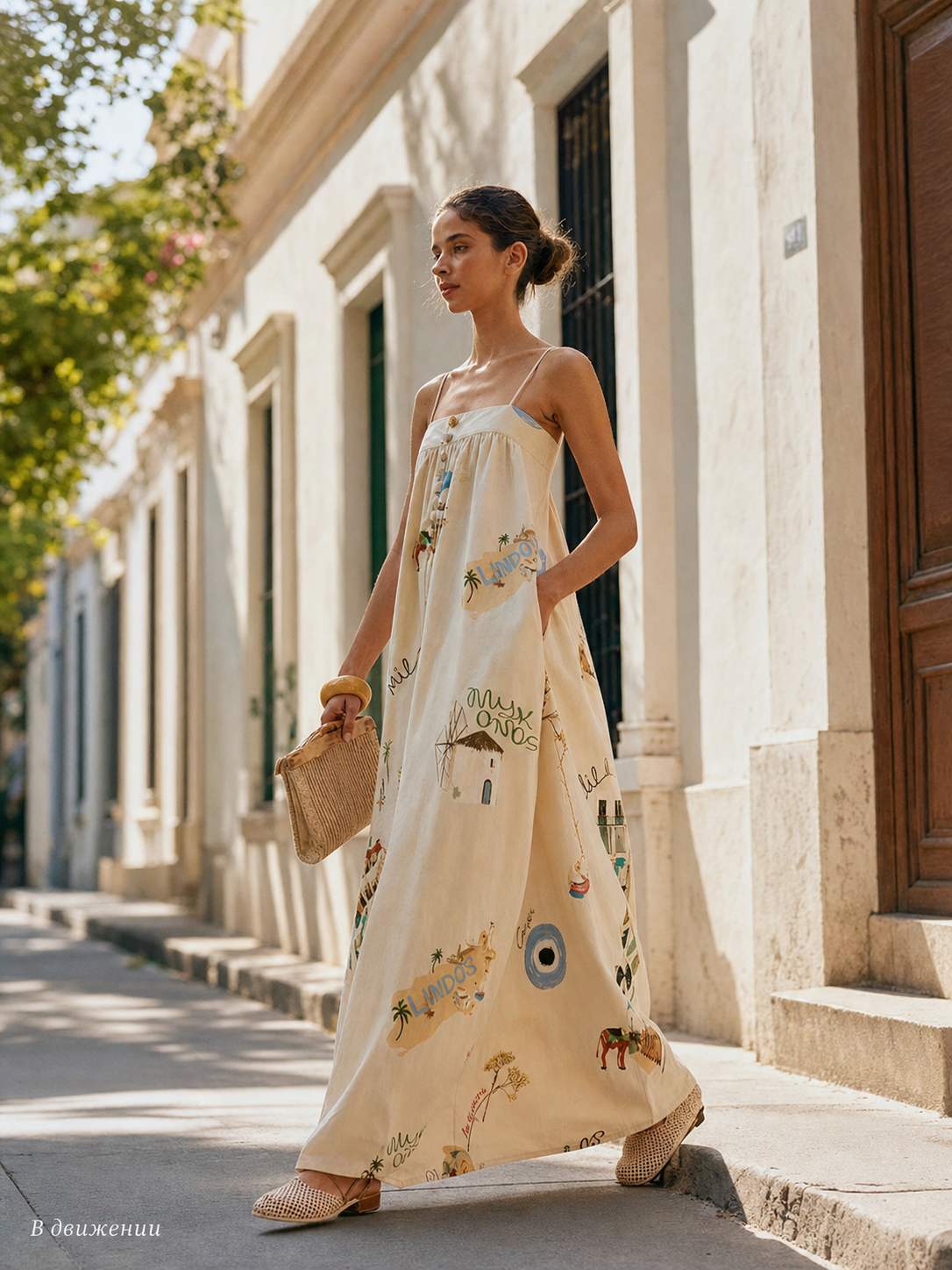 Long dress with thin straps, a print, and buttons