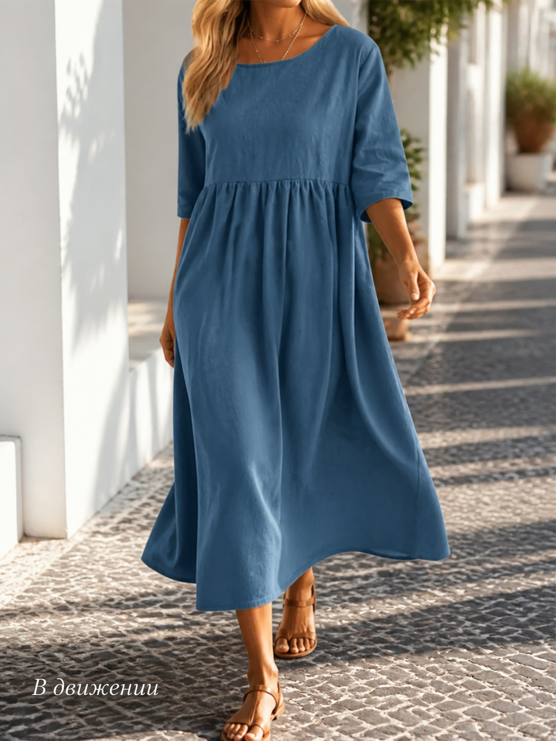 Long A-line dress with a round neckline and pockets