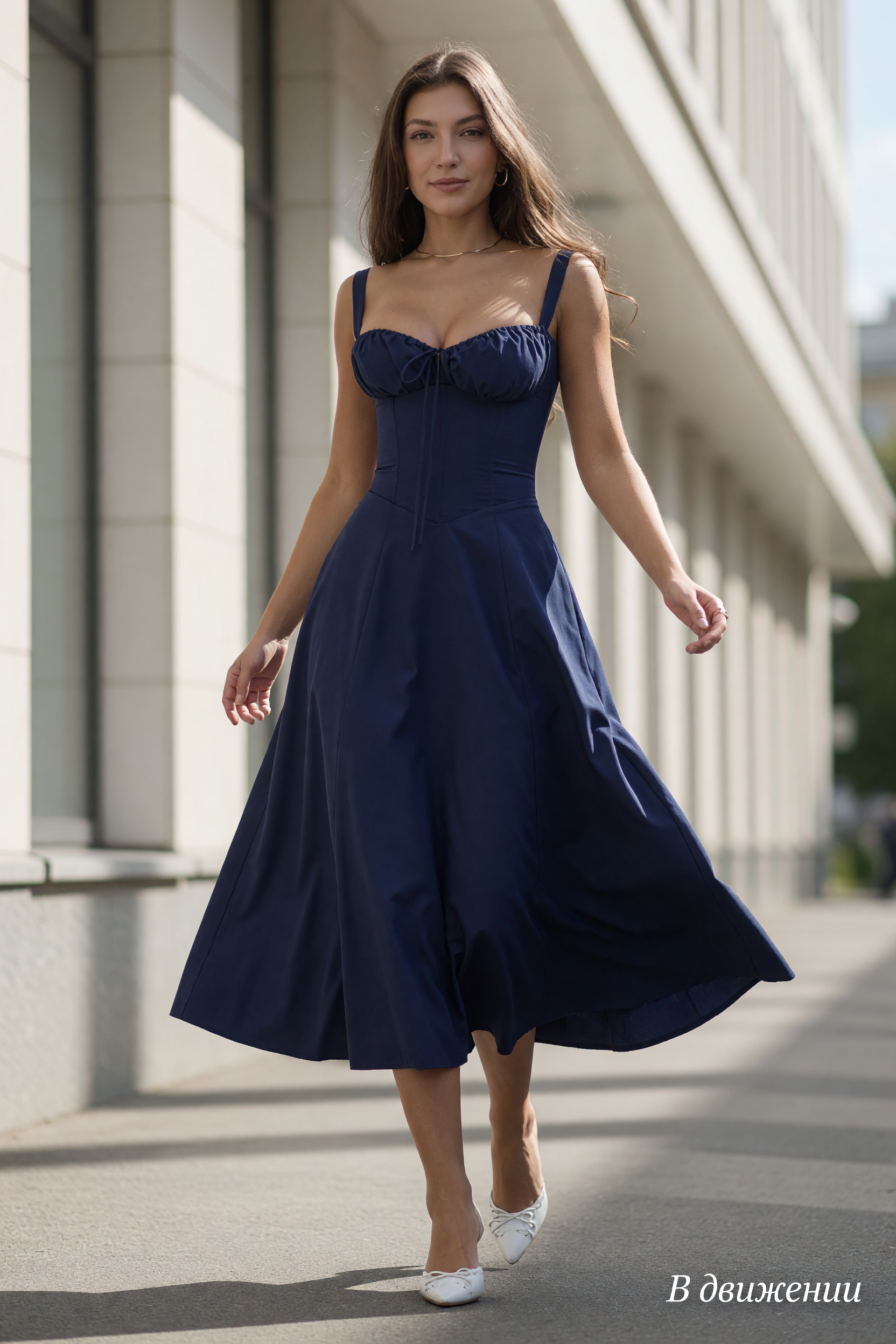 Women’s dark navy dress with thin straps and a corset-style bodice