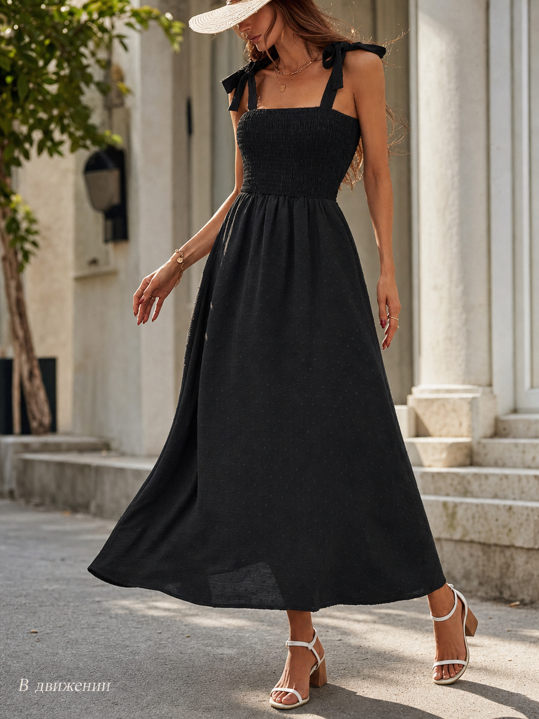 Women's black maxi dress with straps and a square neckline