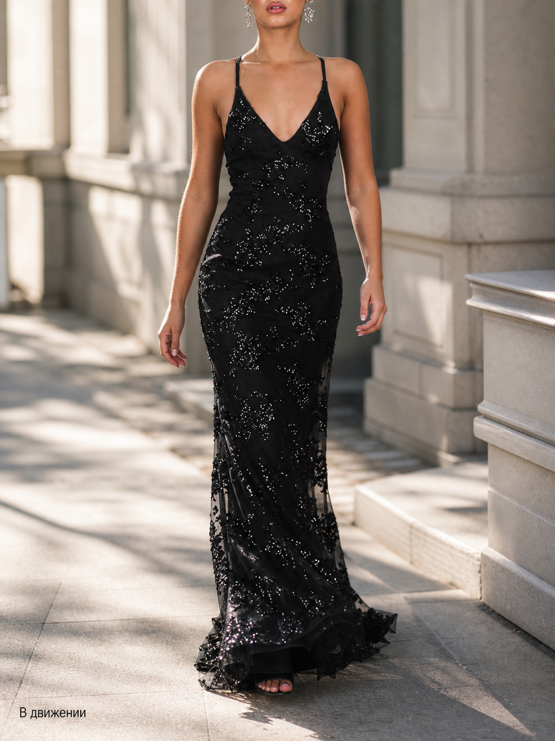 Black women’s sequin dress with a V-neck and mermaid skirt