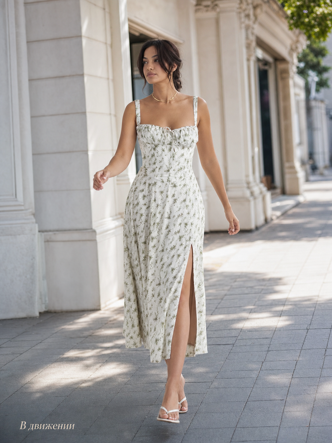 Lightweight midi dress with thin straps, floral print, slit, and fitted silhouette