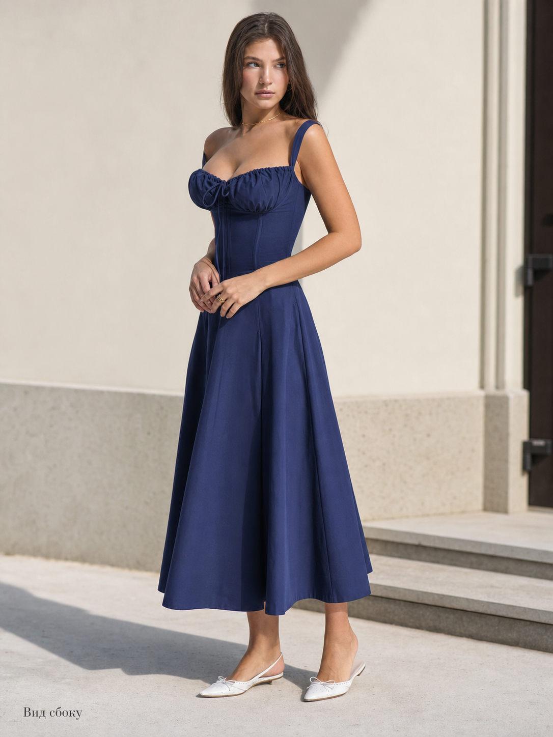 Women’s dark navy dress with thin straps and a corset-style bodice