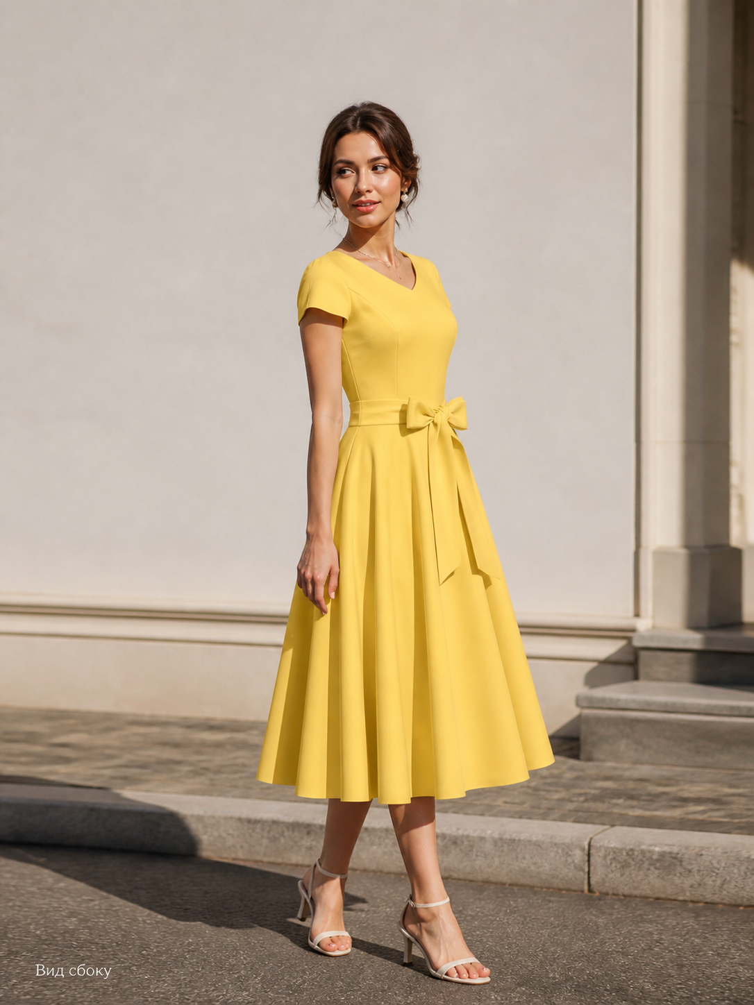 Yellow Dress with a V-Neck, Short Sleeves, and a Bow