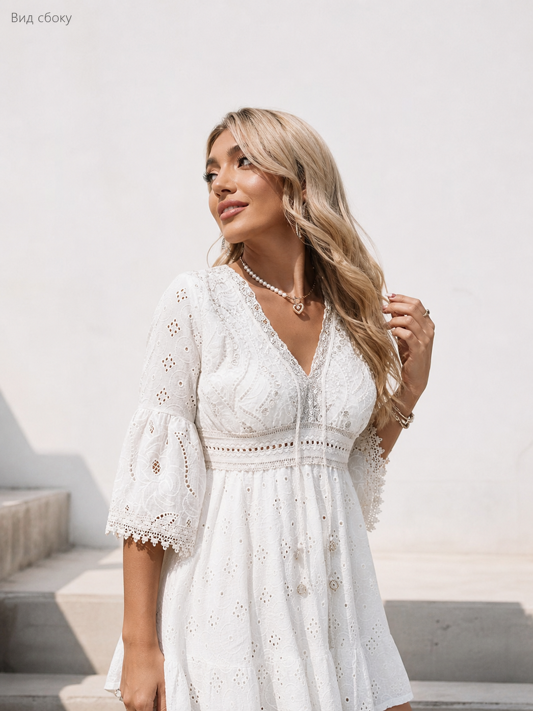 White Embroidered Dress with V-Neck and A-Line Silhouette