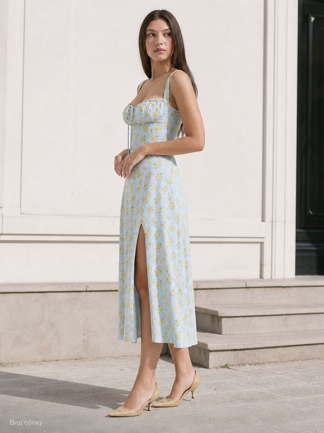 Women's midi dress with thin straps and a slit