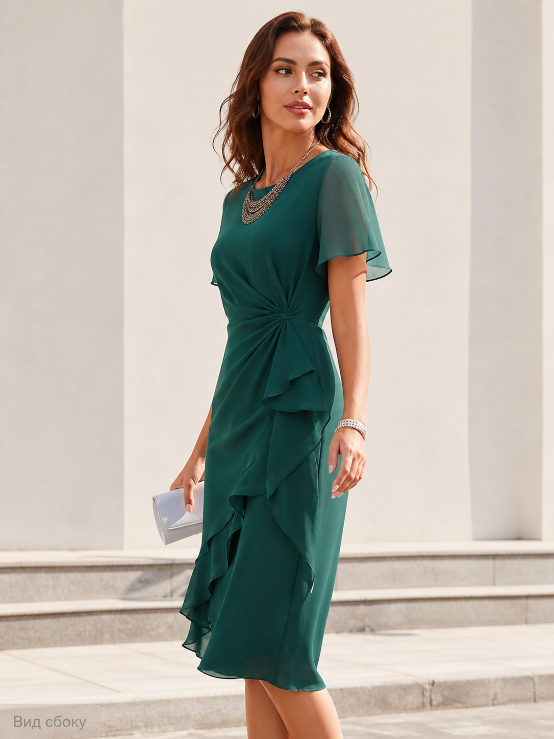 Green short-sleeve dress with an asymmetrical ruffle