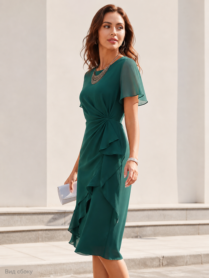 Green short-sleeve dress with an asymmetrical ruffle