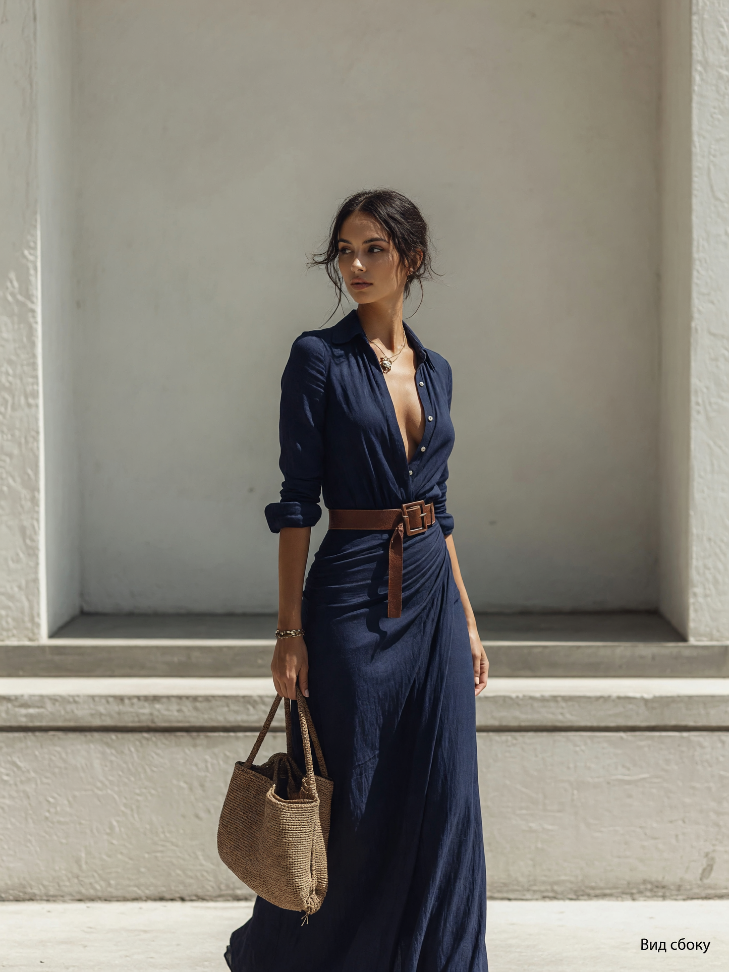 Women's dark navy dress with a belt and long sleeves