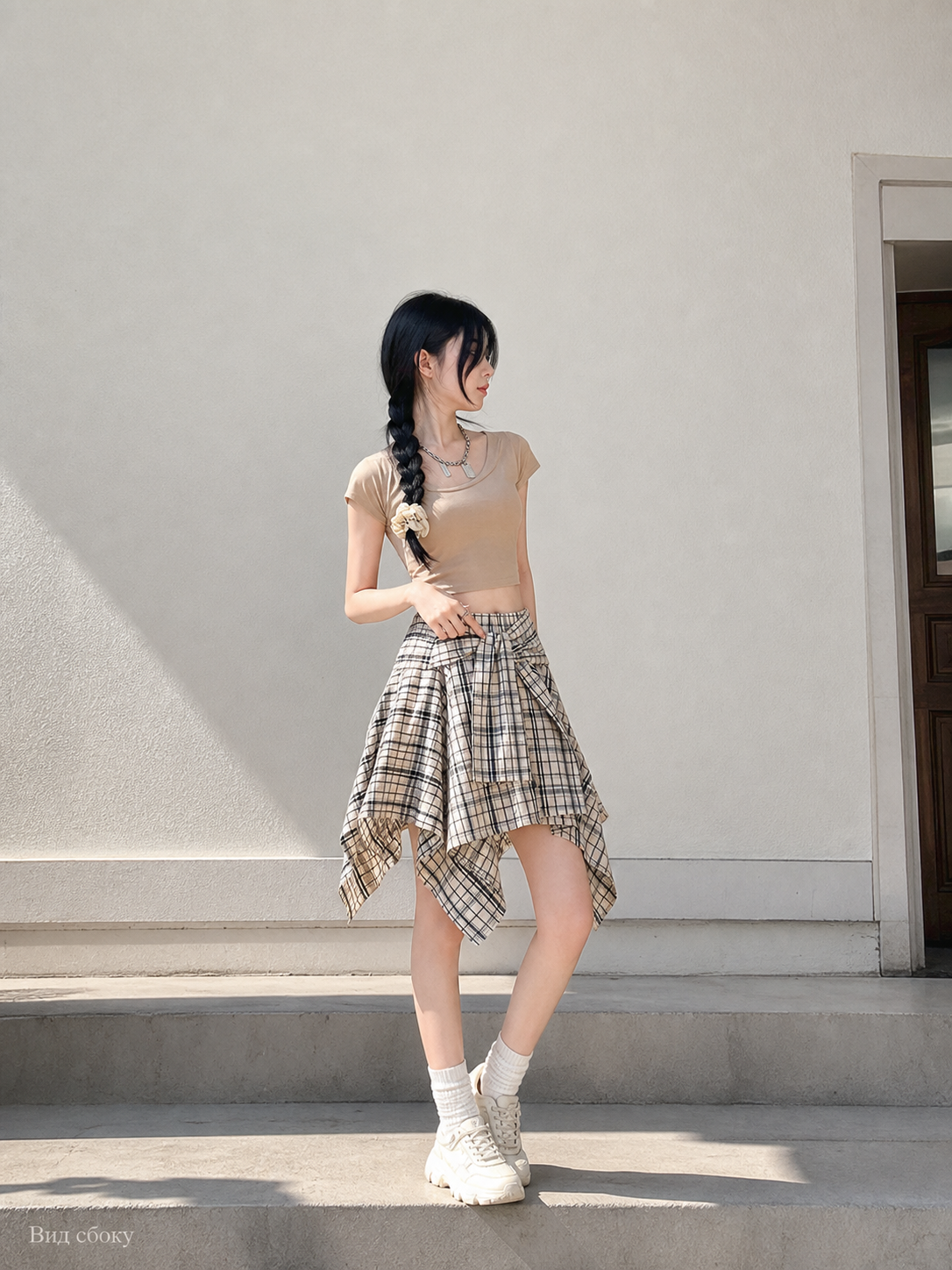 Women's set with a cropped top and plaid skirt