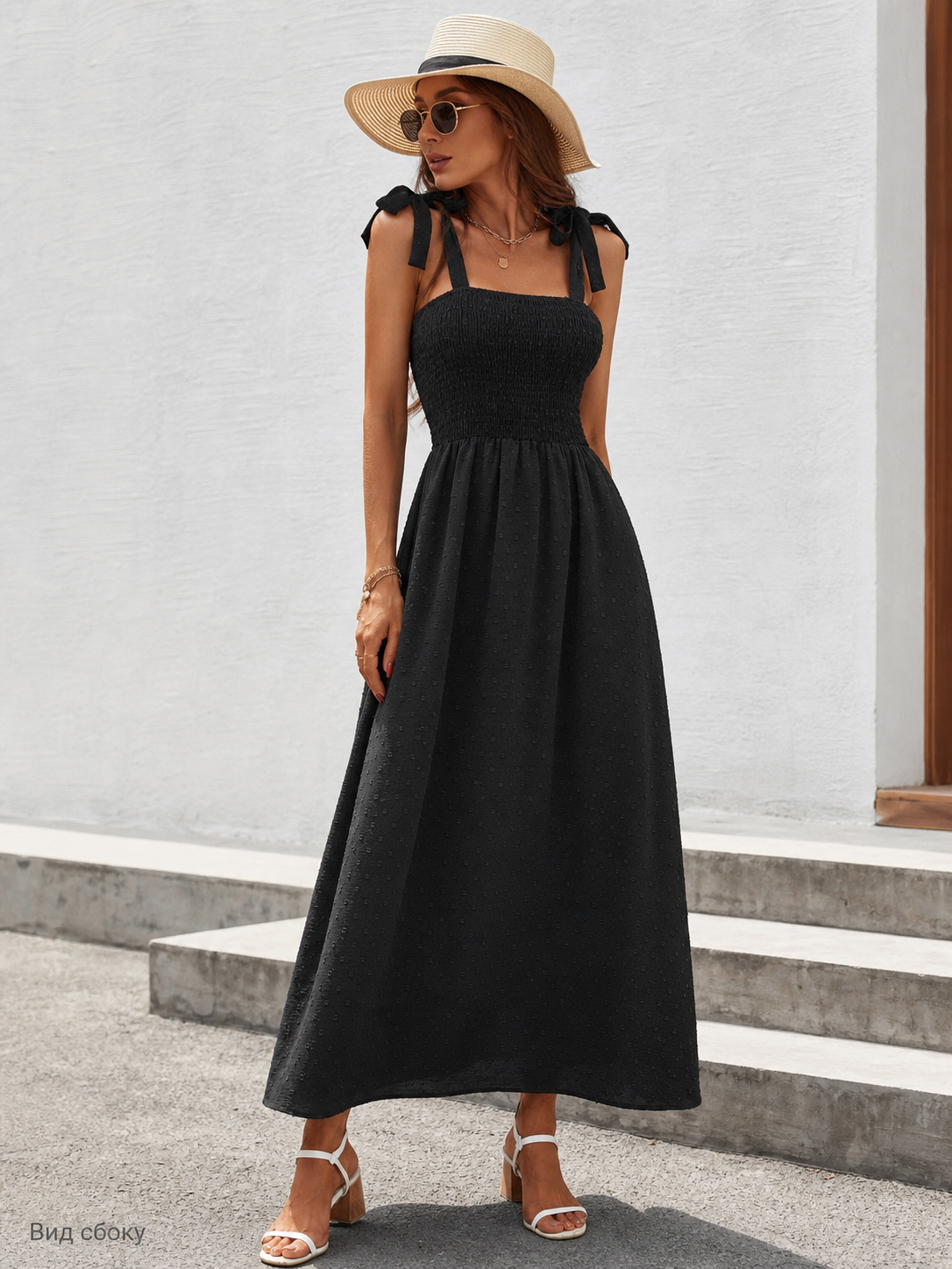 Women's black maxi dress with straps and a square neckline