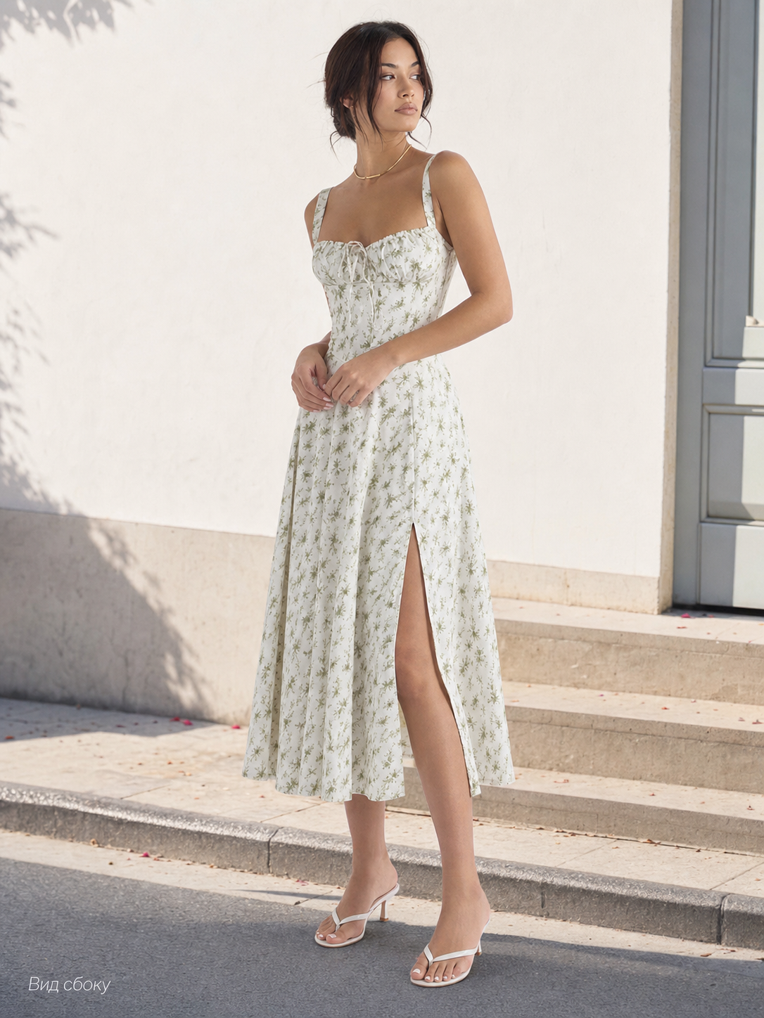 Lightweight midi dress with thin straps, floral print, slit, and fitted silhouette
