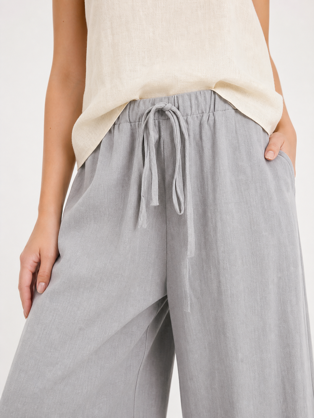 Gray wide-leg jeans with a drawstring and elastic waistband
