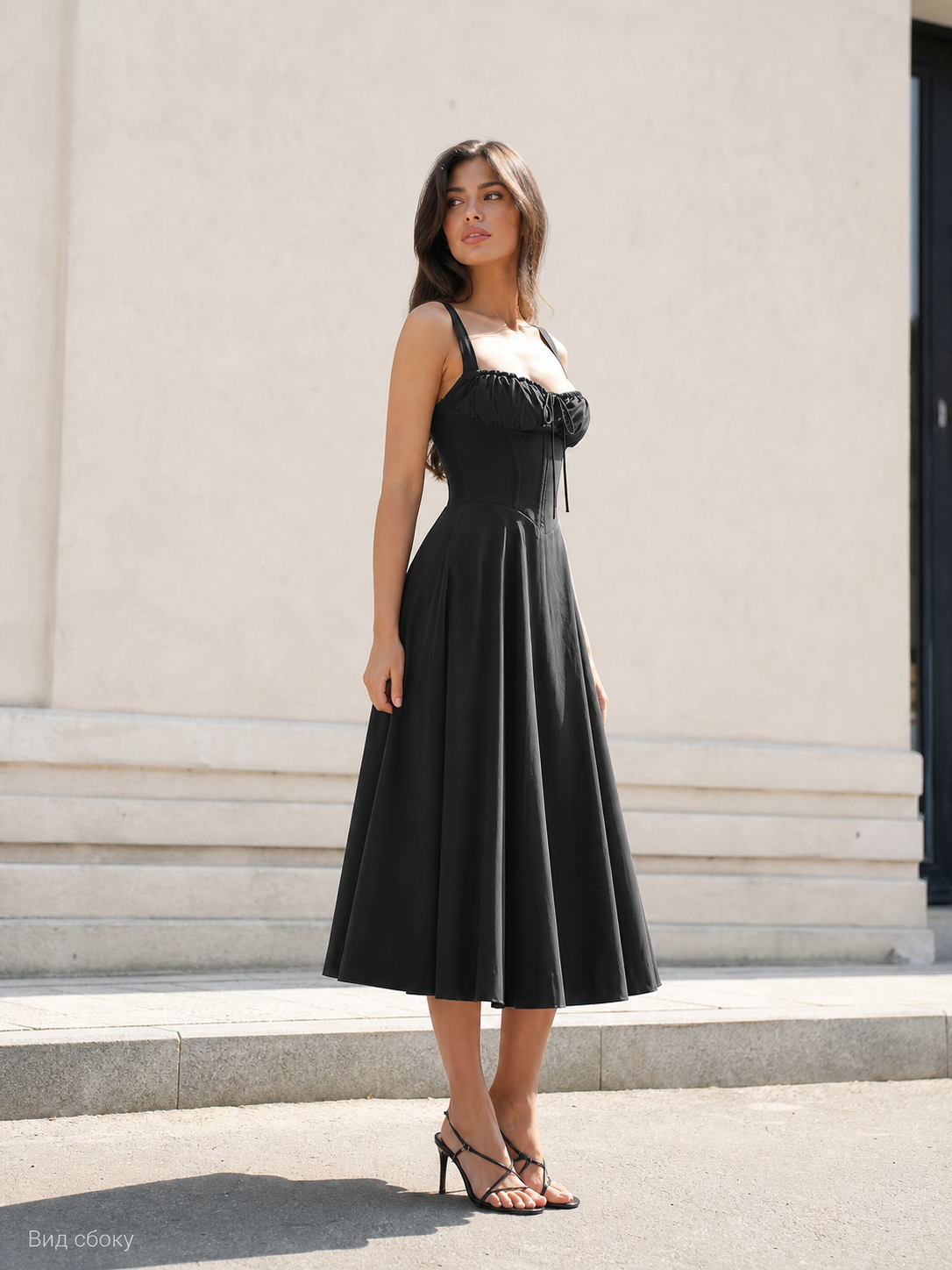 Black midi dress with spaghetti straps and a drawstring