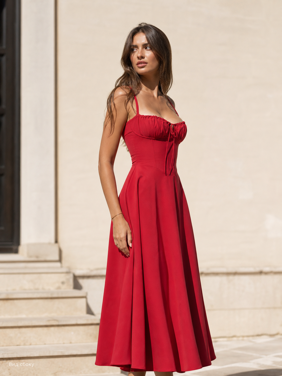 Red dress with thin straps and a fitted silhouette