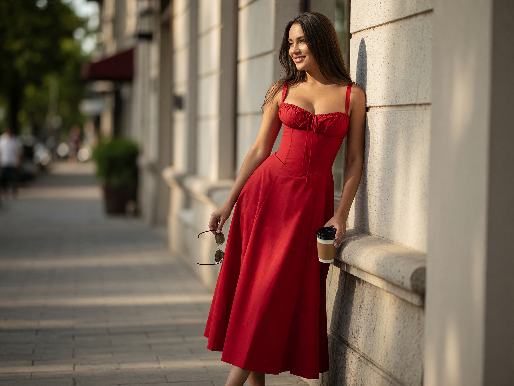 Red dress with thin straps and a fitted silhouette