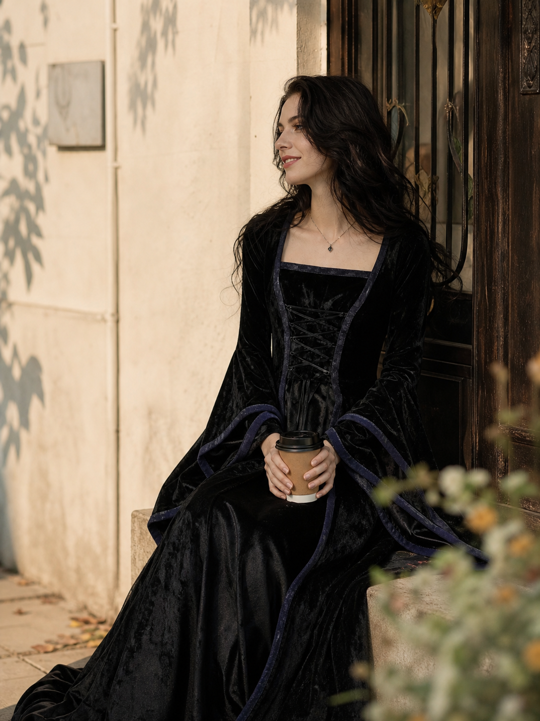 Gothic Black Dress with Lace-Up Detail and Long Sleeves