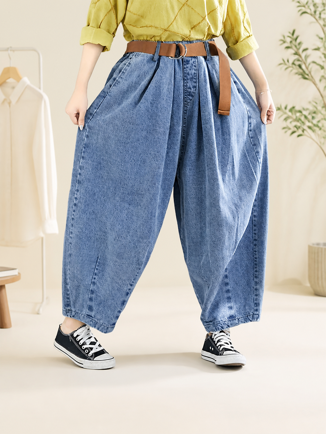 Wide-leg harem pants with a high rise and belt
